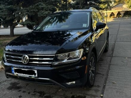 Черный Фольксваген Тигуан, объемом двигателя 2 л и пробегом 127 тыс. км за 22000 $, фото 1 на Automoto.ua