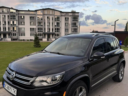 Чорний Фольксваген Тігуан, об'ємом двигуна 2 л та пробігом 117 тис. км за 15800 $, фото 1 на Automoto.ua