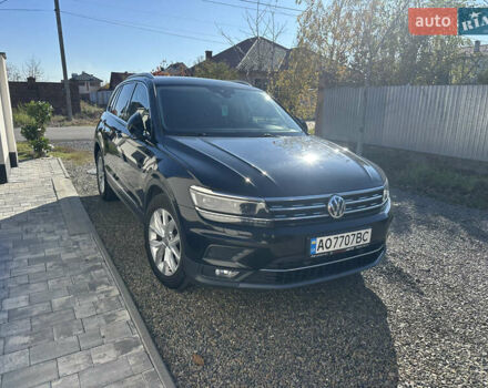Черный Фольксваген Тигуан, объемом двигателя 1.97 л и пробегом 235 тыс. км за 21000 $, фото 1 на Automoto.ua