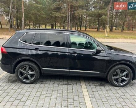 Черный Фольксваген Тигуан, объемом двигателя 1.98 л и пробегом 160 тыс. км за 18000 $, фото 1 на Automoto.ua