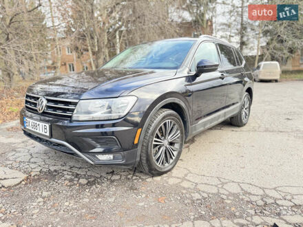 Черный Фольксваген Тигуан, объемом двигателя 2 л и пробегом 183 тыс. км за 19700 $, фото 1 на Automoto.ua