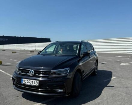 Черный Фольксваген Тигуан, объемом двигателя 2 л и пробегом 160 тыс. км за 24200 $, фото 1 на Automoto.ua