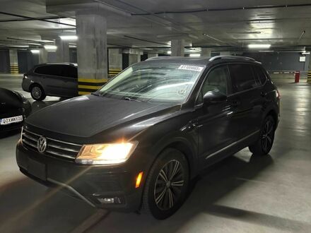 Черный Фольксваген Тигуан, объемом двигателя 2 л и пробегом 185 тыс. км за 12700 $, фото 1 на Automoto.ua