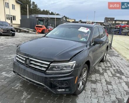 Чорний Фольксваген Тігуан, об'ємом двигуна 2 л та пробігом 94 тис. км за 17260 $, фото 1 на Automoto.ua