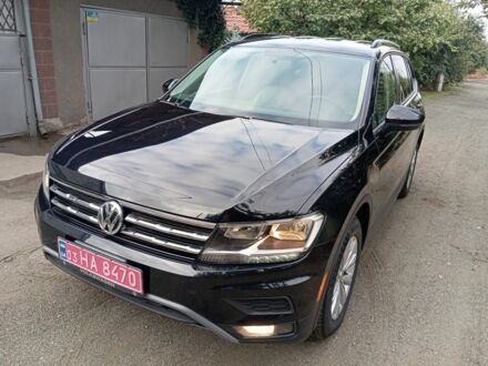 Чорний Фольксваген Тігуан, об'ємом двигуна 2 л та пробігом 149 тис. км за 406 $, фото 1 на Automoto.ua