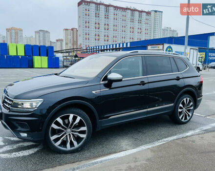 Черный Фольксваген Тигуан, объемом двигателя 1.97 л и пробегом 228 тыс. км за 26000 $, фото 1 на Automoto.ua