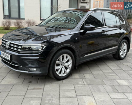 Чорний Фольксваген Тігуан, об'ємом двигуна 2 л та пробігом 208 тис. км за 23800 $, фото 1 на Automoto.ua