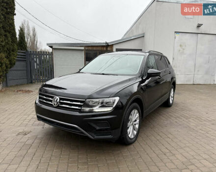 Черный Фольксваген Тигуан, объемом двигателя 1.98 л и пробегом 130 тыс. км за 16550 $, фото 1 на Automoto.ua