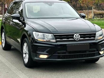 Чорний Фольксваген Тігуан, об'ємом двигуна 2 л та пробігом 150 тис. км за 23000 $, фото 1 на Automoto.ua