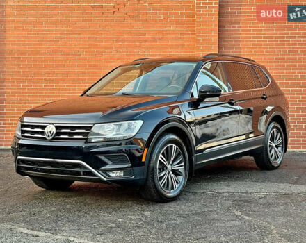 Чорний Фольксваген Тігуан, об'ємом двигуна 2 л та пробігом 157 тис. км за 17000 $, фото 1 на Automoto.ua