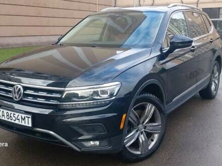 Чорний Фольксваген Тігуан, об'ємом двигуна 2 л та пробігом 112 тис. км за 30000 $, фото 1 на Automoto.ua