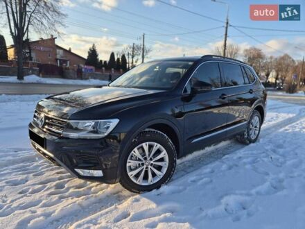 Черный Фольксваген Тигуан, объемом двигателя 2 л и пробегом 133 тыс. км за 18800 $, фото 1 на Automoto.ua