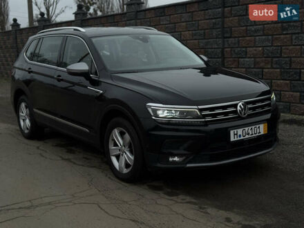 Черный Фольксваген Тигуан, объемом двигателя 1.98 л и пробегом 220 тыс. км за 26500 $, фото 1 на Automoto.ua