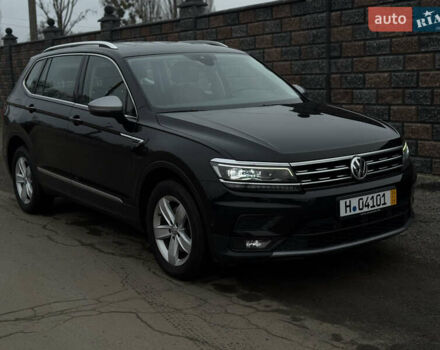 Черный Фольксваген Тигуан, объемом двигателя 1.98 л и пробегом 220 тыс. км за 26500 $, фото 1 на Automoto.ua