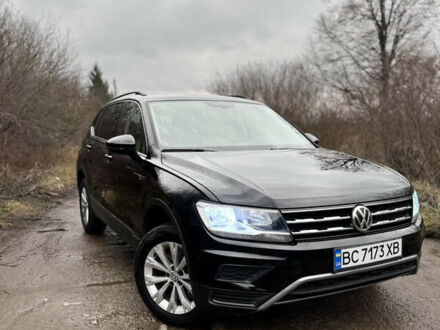 Чорний Фольксваген Тігуан, об'ємом двигуна 1.98 л та пробігом 99 тис. км за 18700 $, фото 1 на Automoto.ua