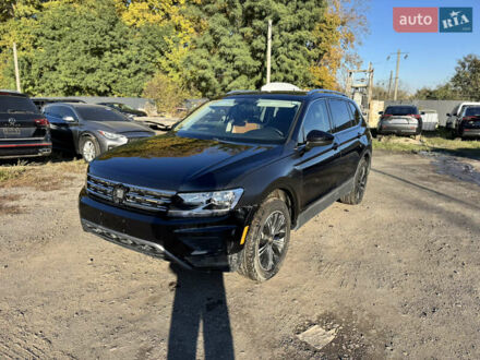 Черный Фольксваген Тигуан, объемом двигателя 2 л и пробегом 133 тыс. км за 11900 $, фото 1 на Automoto.ua