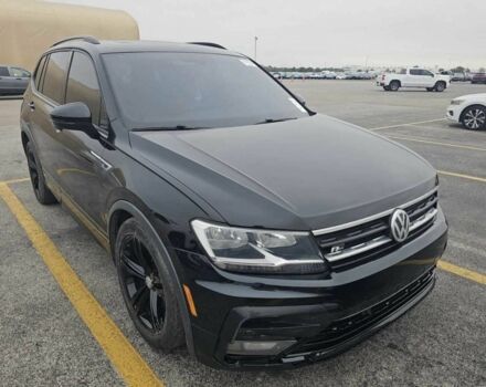 Чорний Фольксваген Тігуан, об'ємом двигуна 2 л та пробігом 124 тис. км за 15800 $, фото 1 на Automoto.ua