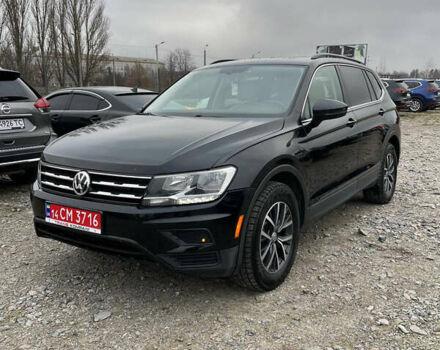 Черный Фольксваген Тигуан, объемом двигателя 2 л и пробегом 183 тыс. км за 19600 $, фото 1 на Automoto.ua