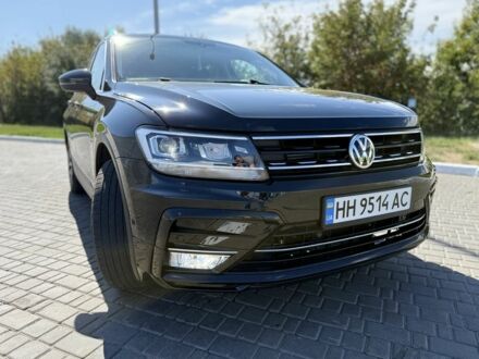 Чорний Фольксваген Тігуан, об'ємом двигуна 2 л та пробігом 133 тис. км за 19700 $, фото 1 на Automoto.ua