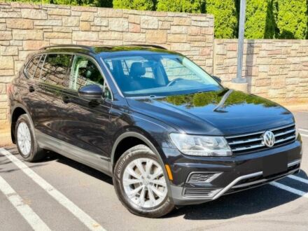 Чорний Фольксваген Тігуан, об'ємом двигуна 2 л та пробігом 35 тис. км за 14000 $, фото 1 на Automoto.ua