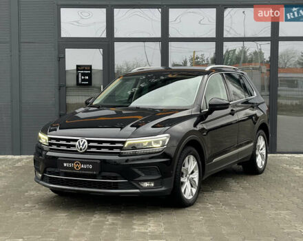 Черный Фольксваген Тигуан, объемом двигателя 1.98 л и пробегом 285 тыс. км за 22800 $, фото 1 на Automoto.ua