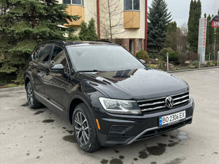 Черный Фольксваген Тигуан, объемом двигателя 2 л и пробегом 130 тыс. км за 18500 $, фото 1 на Automoto.ua