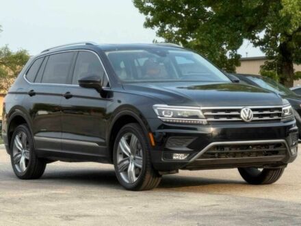 Чорний Фольксваген Тігуан, об'ємом двигуна 2 л та пробігом 33 тис. км за 8800 $, фото 1 на Automoto.ua