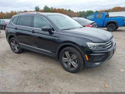 Черный Фольксваген Тигуан, объемом двигателя 2 л и пробегом 67 тыс. км за 5000 $, фото 1 на Automoto.ua