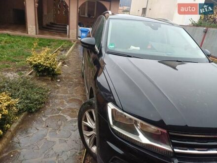 Чорний Фольксваген Тігуан, об'ємом двигуна 1.97 л та пробігом 220 тис. км за 23500 $, фото 1 на Automoto.ua