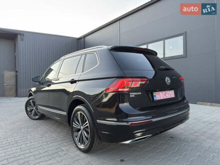 Черный Фольксваген Тигуан, объемом двигателя 2 л и пробегом 231 тыс. км за 16300 $, фото 1 на Automoto.ua