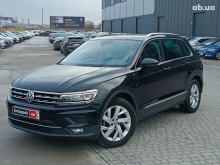 Черный Фольксваген Тигуан, объемом двигателя 2 л и пробегом 190 тыс. км за 23200 $, фото 1 на Automoto.ua