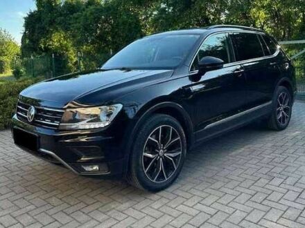 Черный Фольксваген Тигуан, объемом двигателя 2 л и пробегом 98 тыс. км за 15000 $, фото 1 на Automoto.ua