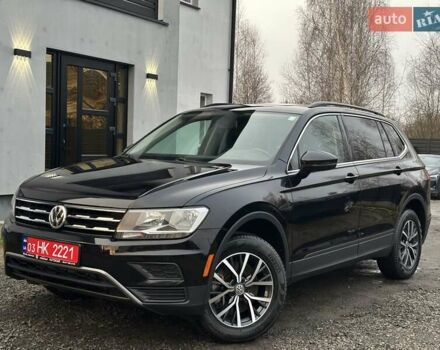 Черный Фольксваген Тигуан, объемом двигателя 2 л и пробегом 200 тыс. км за 15900 $, фото 1 на Automoto.ua