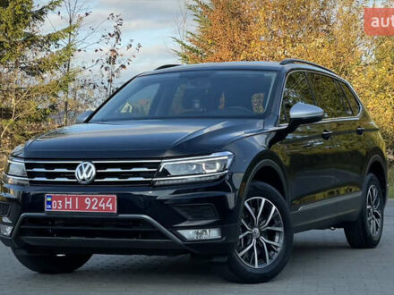 Черный Фольксваген Тигуан, объемом двигателя 2 л и пробегом 170 тыс. км за 18799 $, фото 1 на Automoto.ua