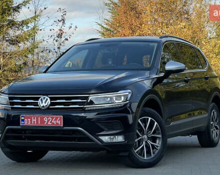 Черный Фольксваген Тигуан, объемом двигателя 2 л и пробегом 170 тыс. км за 18799 $, фото 1 на Automoto.ua