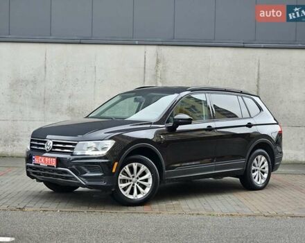 Черный Фольксваген Тигуан, объемом двигателя 2 л и пробегом 106 тыс. км за 18999 $, фото 1 на Automoto.ua