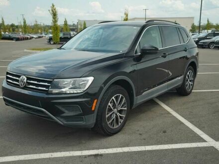 Чорний Фольксваген Тігуан, об'ємом двигуна 2 л та пробігом 47 тис. км за 9500 $, фото 1 на Automoto.ua