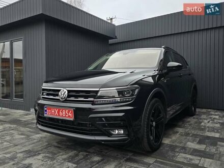 Чорний Фольксваген Тігуан, об'ємом двигуна 2 л та пробігом 199 тис. км за 31000 $, фото 1 на Automoto.ua