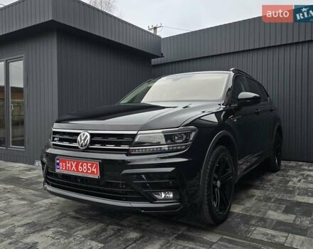 Черный Фольксваген Тигуан, объемом двигателя 2 л и пробегом 199 тыс. км за 31000 $, фото 1 на Automoto.ua