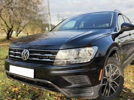 Черный Фольксваген Тигуан, объемом двигателя 2 л и пробегом 115 тыс. км за 12700 $, фото 1 на Automoto.ua