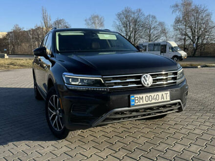 Чорний Фольксваген Тігуан, об'ємом двигуна 2 л та пробігом 160 тис. км за 21000 $, фото 1 на Automoto.ua