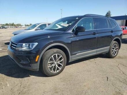 Черный Фольксваген Тигуан, объемом двигателя 2 л и пробегом 64 тыс. км за 4000 $, фото 1 на Automoto.ua