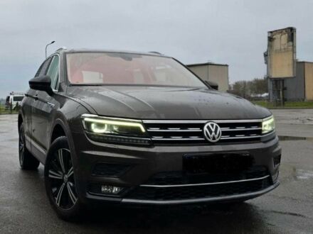 Чорний Фольксваген Тігуан, об'ємом двигуна 0 л та пробігом 82 тис. км за 13600 $, фото 1 на Automoto.ua