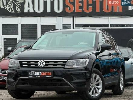 Чорний Фольксваген Тігуан, об'ємом двигуна 2 л та пробігом 129 тис. км за 17500 $, фото 1 на Automoto.ua