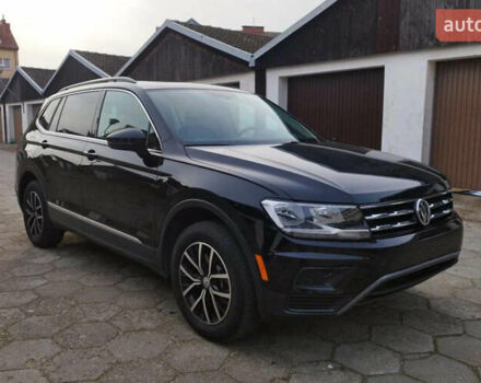 Черный Фольксваген Тигуан, объемом двигателя 2 л и пробегом 96 тыс. км за 16300 $, фото 1 на Automoto.ua