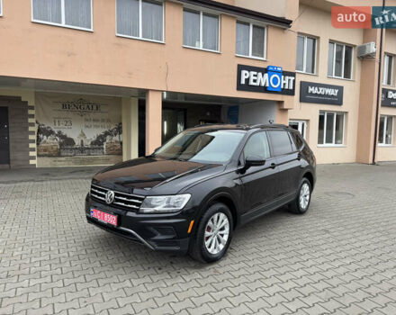 Черный Фольксваген Тигуан, объемом двигателя 2 л и пробегом 232 тыс. км за 14300 $, фото 1 на Automoto.ua