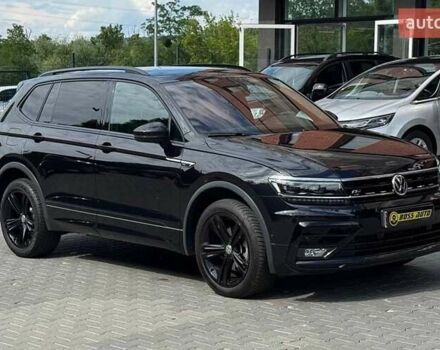 Черный Фольксваген Тигуан, объемом двигателя 2 л и пробегом 124 тыс. км за 36500 $, фото 1 на Automoto.ua