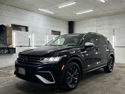 Черный Фольксваген Тигуан, объемом двигателя 2 л и пробегом 115 тыс. км за 21499 $, фото 1 на Automoto.ua