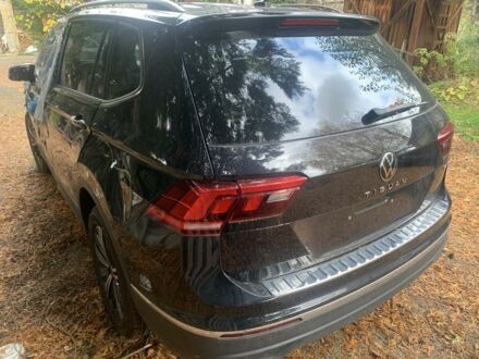 Чорний Фольксваген Тігуан, об'ємом двигуна 2 л та пробігом 14 тис. км за 12900 $, фото 1 на Automoto.ua