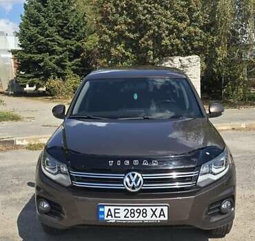 Коричневый Фольксваген Тигуан, объемом двигателя 1.97 л и пробегом 230 тыс. км за 13500 $, фото 1 на Automoto.ua